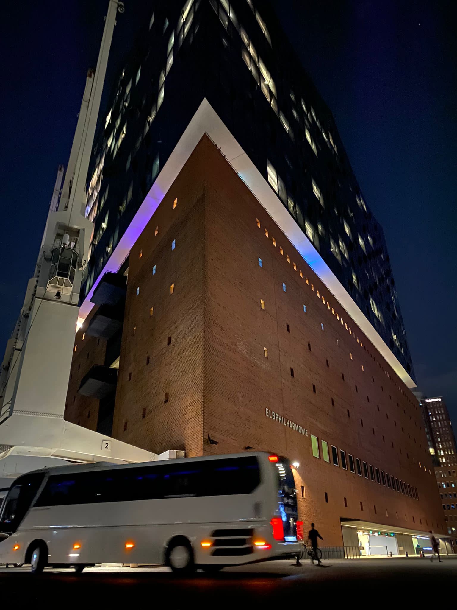 Tour coach at the Elbphilharmonie Hamburg at night